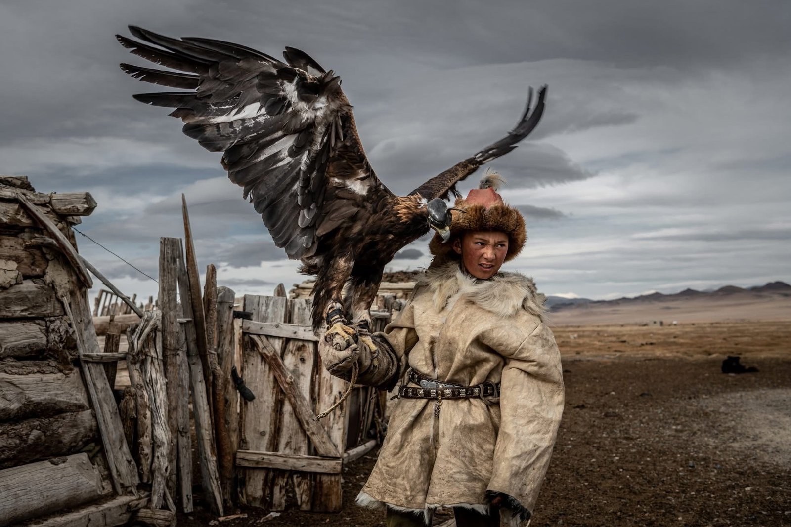 Kazakh eagle hunter on horseback in Western Mongolia